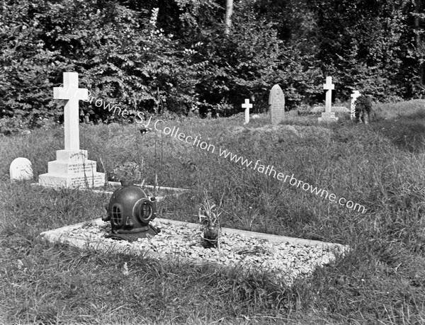 CHURCHYARD 'QUEER' TOMBSTONE (DIVER'S MASK)